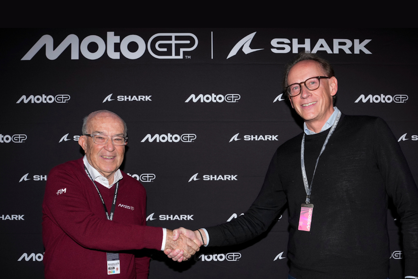 Carmelo Ezpeleta , Dorna Sports (L) and Christophe Merkel, 2 Ride (R)