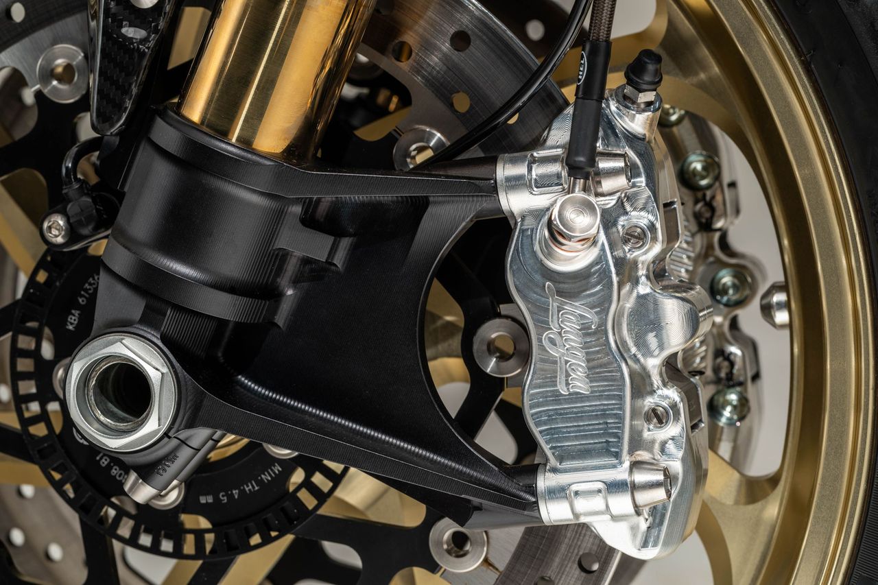 Specially developed brakes feature at the front