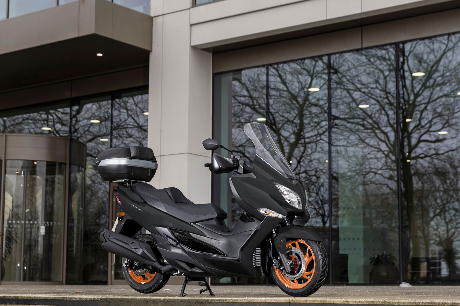 Suzuki Burgman 400 parked on a pavement