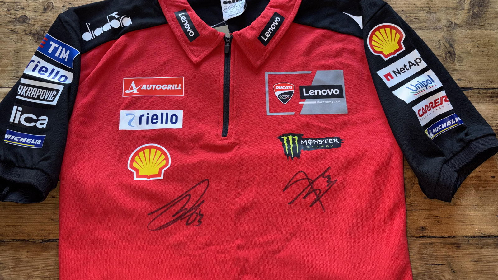 Ducati Lenovo polo signed by Marc Marquez and Francesco Bagnaia