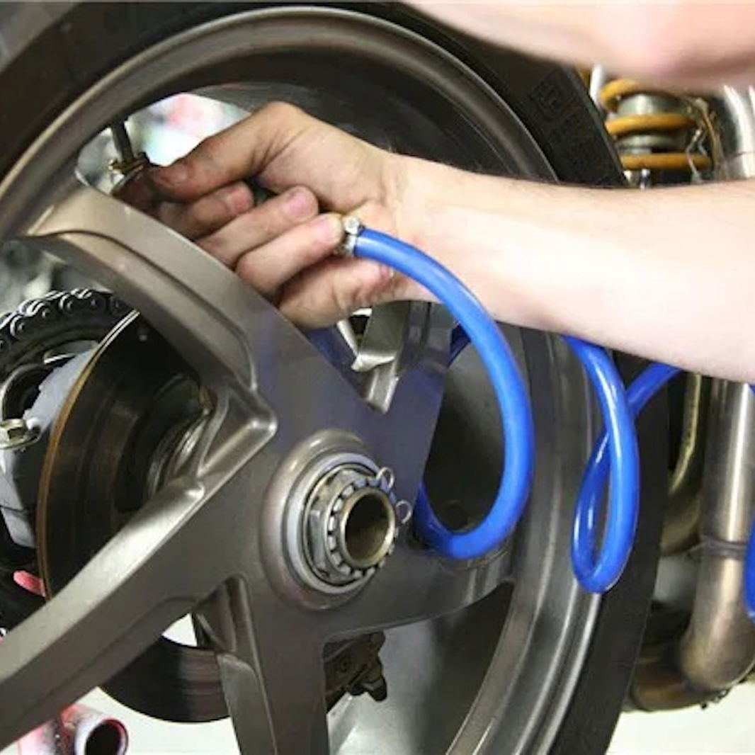 Pumping up the tyre of a Ducati 916