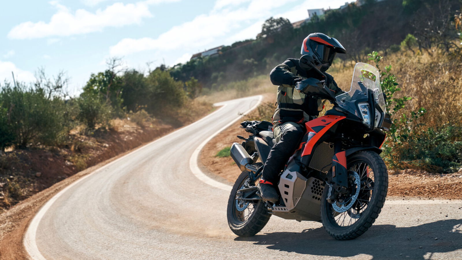 KTM 790 Adventure bike riding on the road