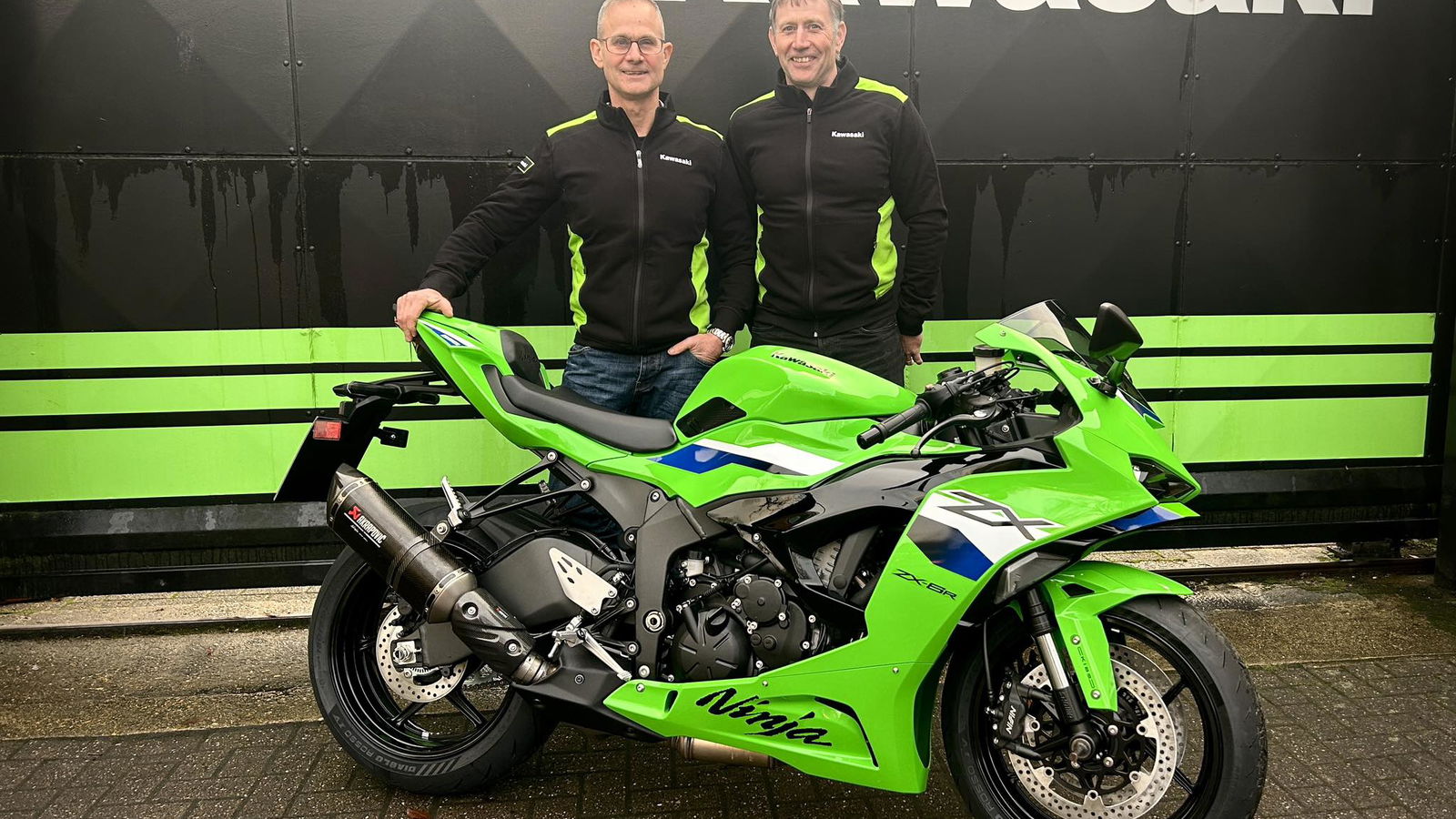 James Whitham and Paul Drinkwater standing next to a Kawasaki ZX-6R