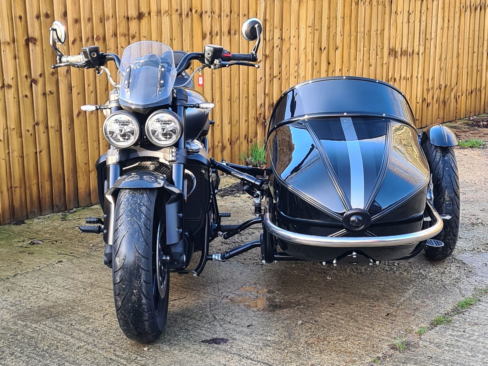 Front view of Triumph Rocket 3 with a Watsonian sidecar
