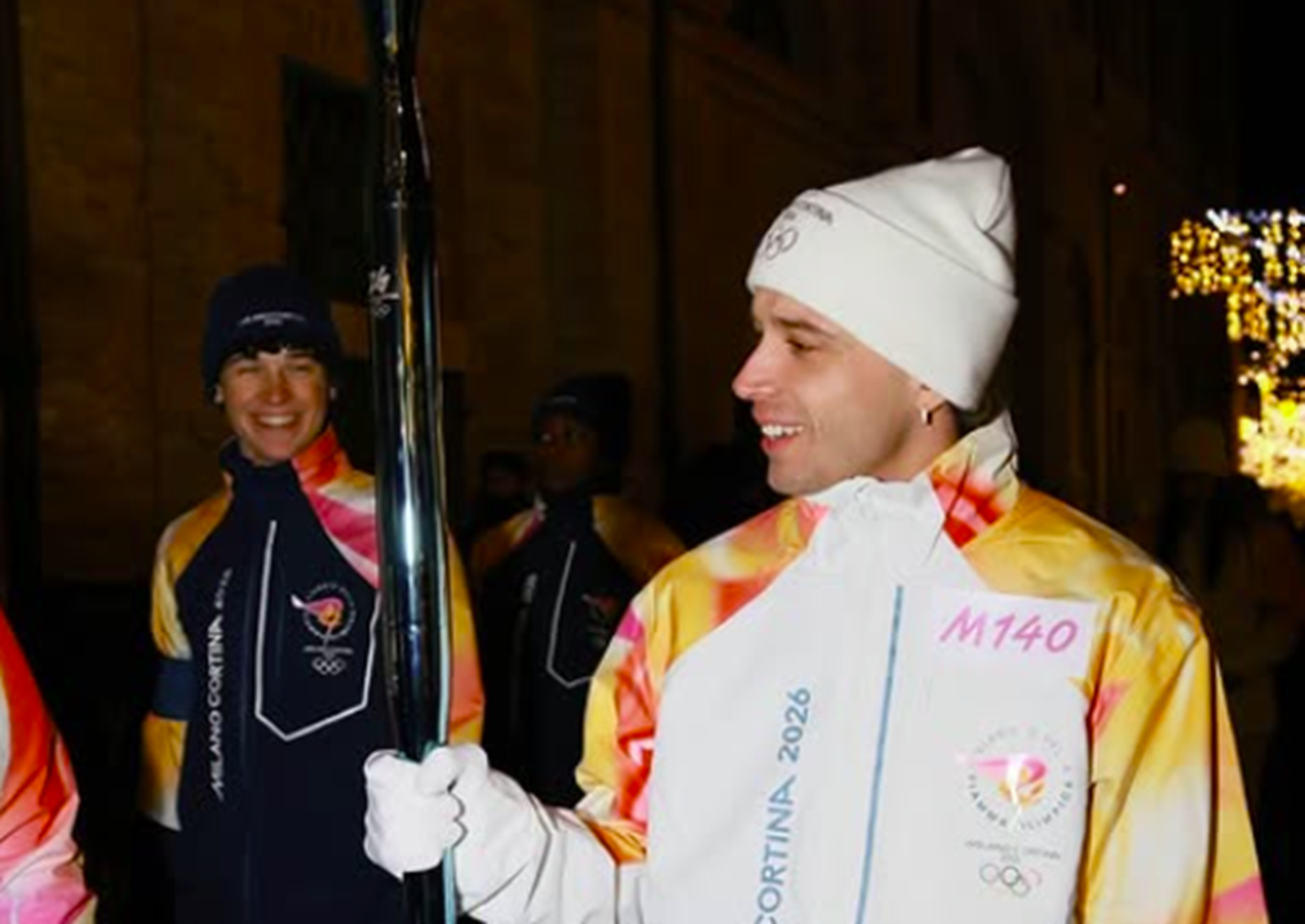 Marco Bezzecchi carries 2026 Winter Olympic flame on 5 January. Credit: Instagram/MotoGP.