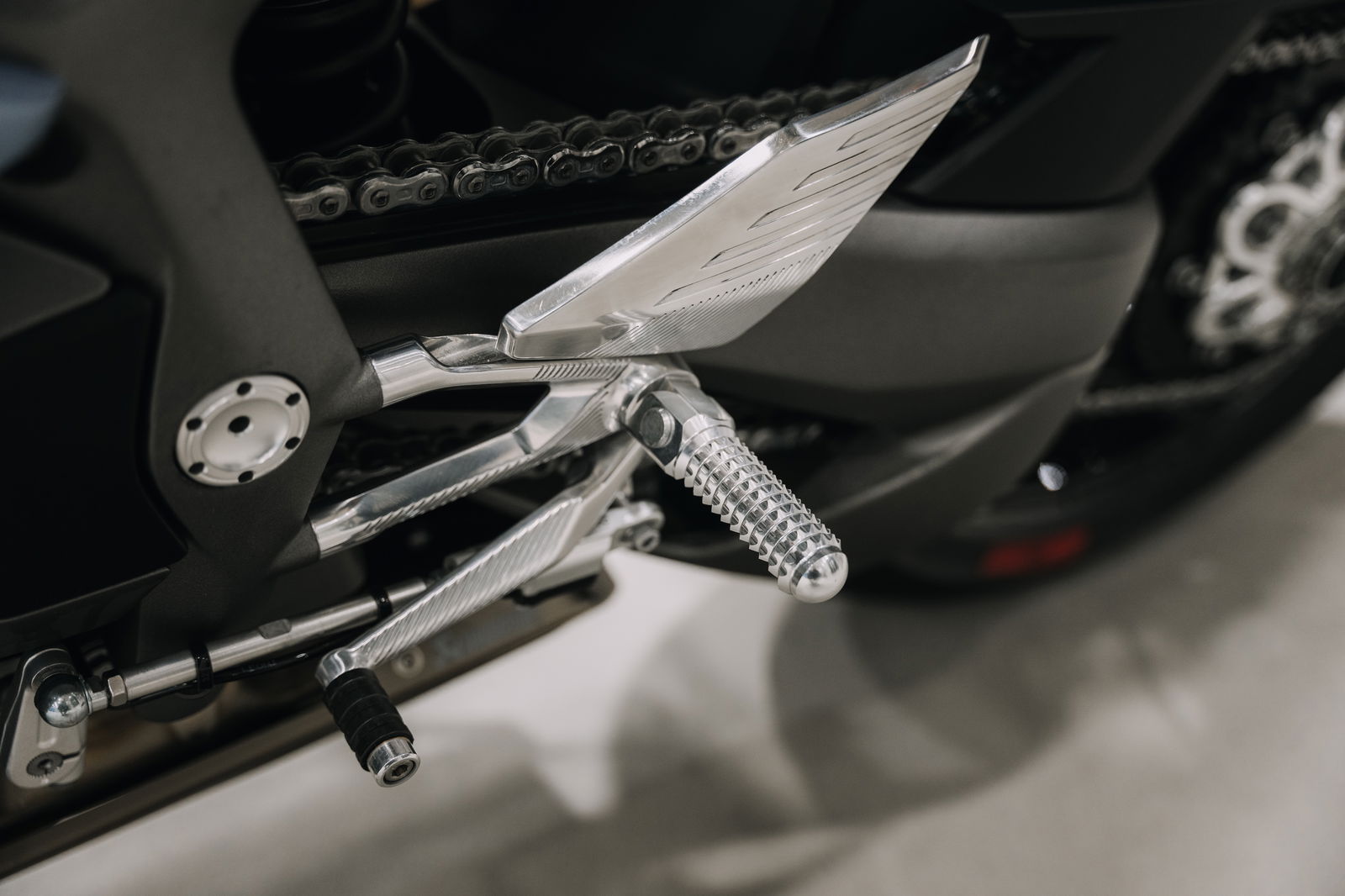 A footpeg on the Manx R