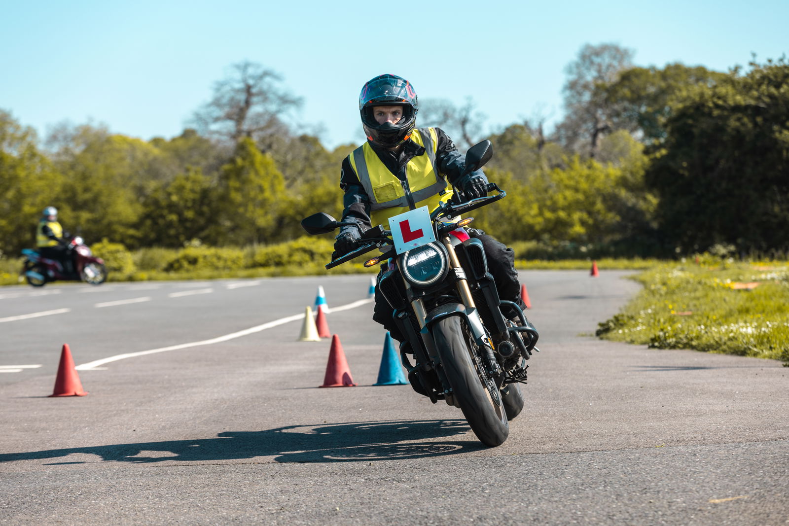 A motorcycle trainee performing drills