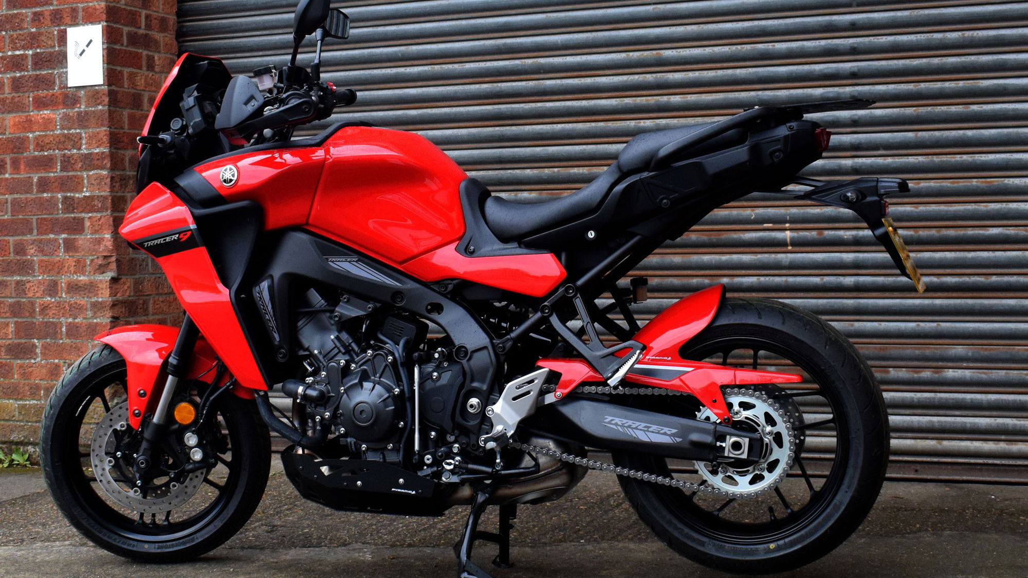 A red Yamaha Tracer 9 GT