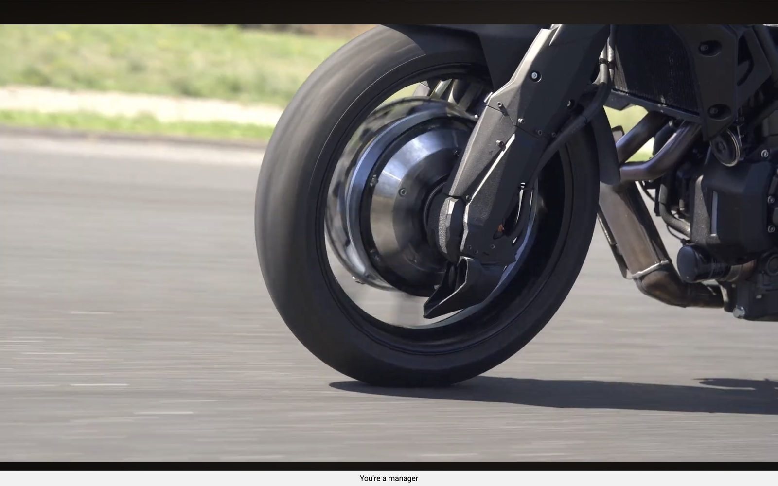 The front wheel features a hub-mounted motor/generator