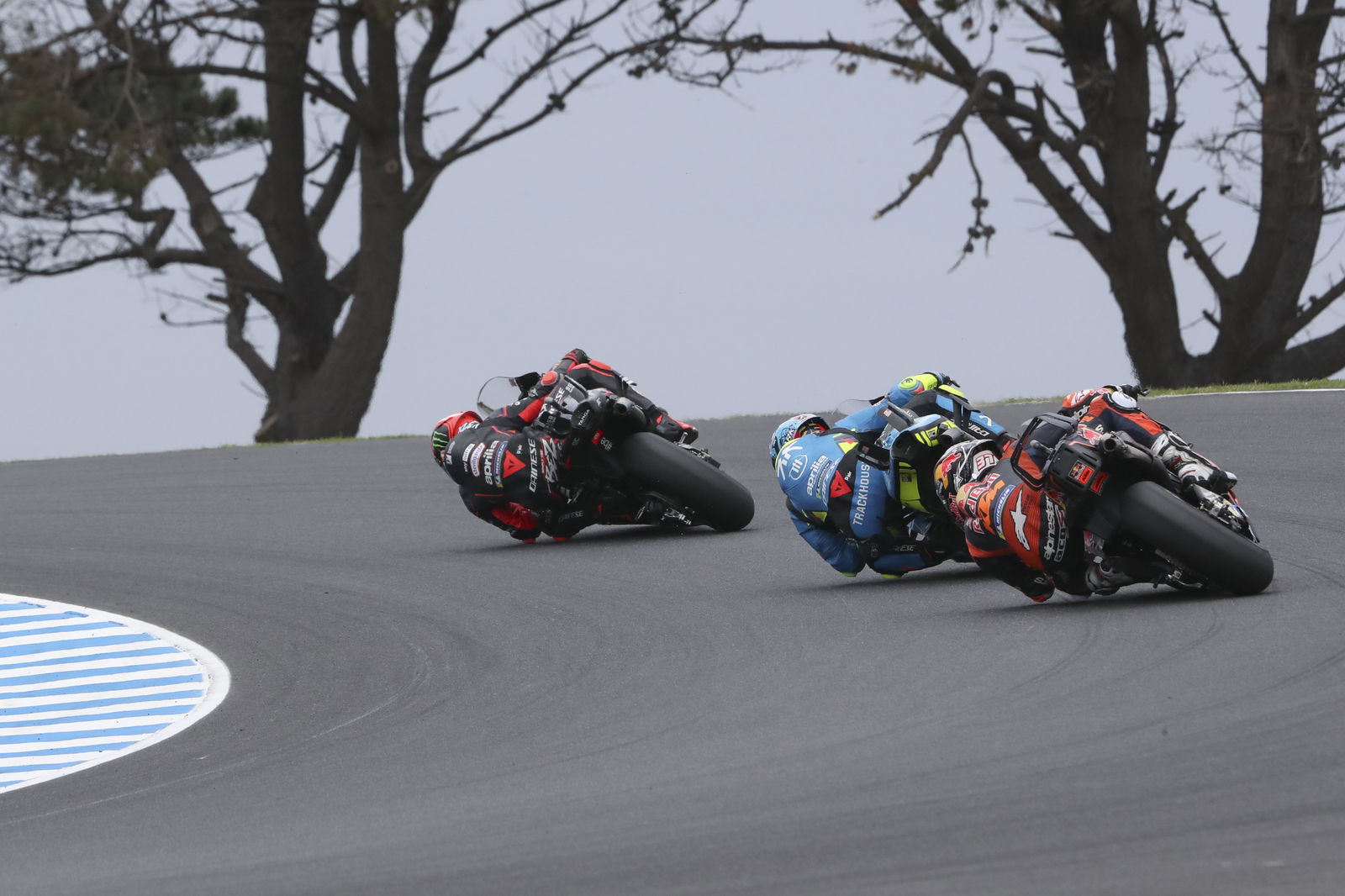 Marco Bezzecchi leads Raul Fernandez, Pedro Acosta, 2025 MotoGP Australian Grand Prix. Credit: Gold and Goose.