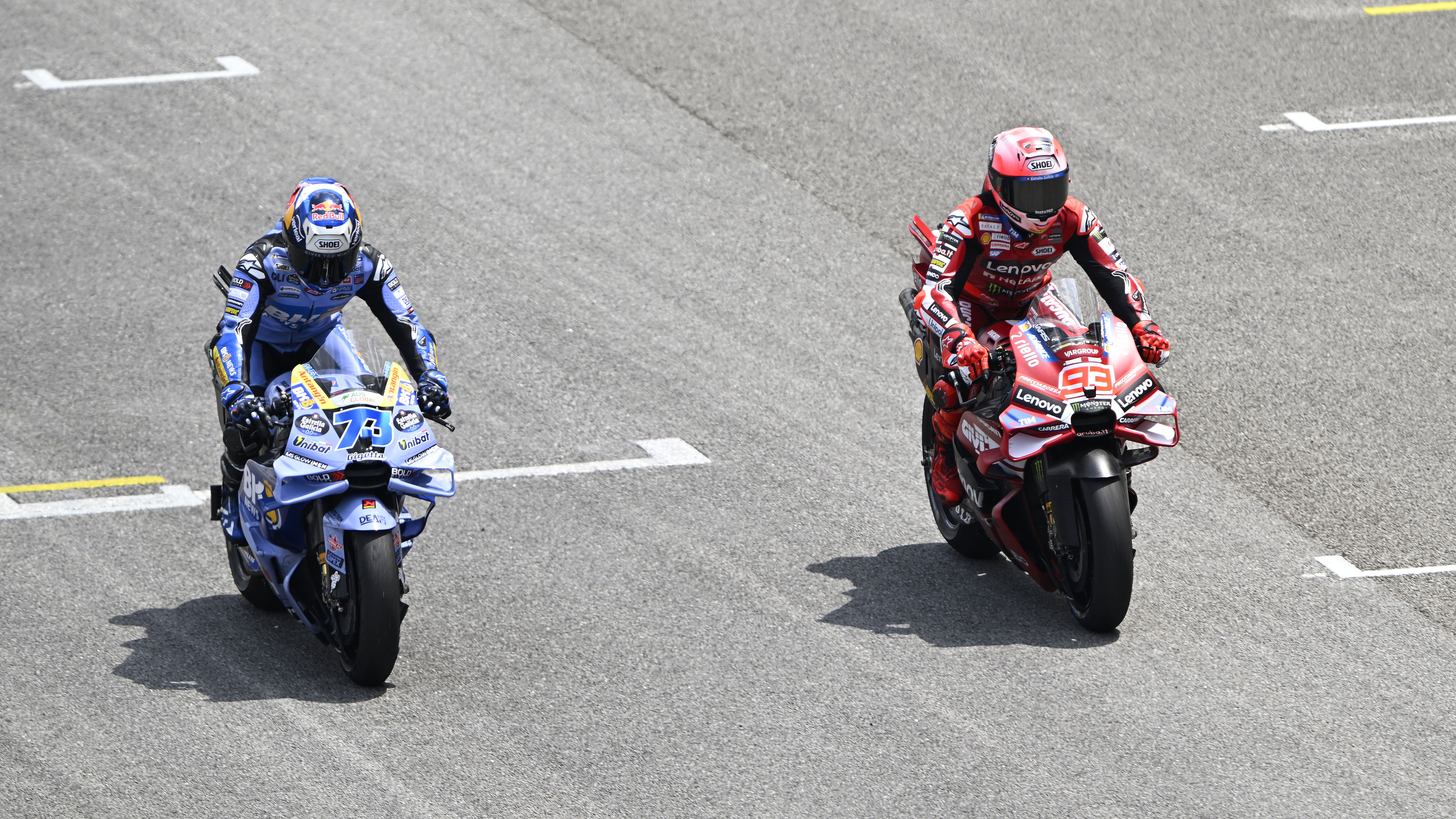 Alex Marquez and Marc Marquez rolling up to practice starts, 2026 MotoGP Sepang Test. Credit: Gold and Goose.