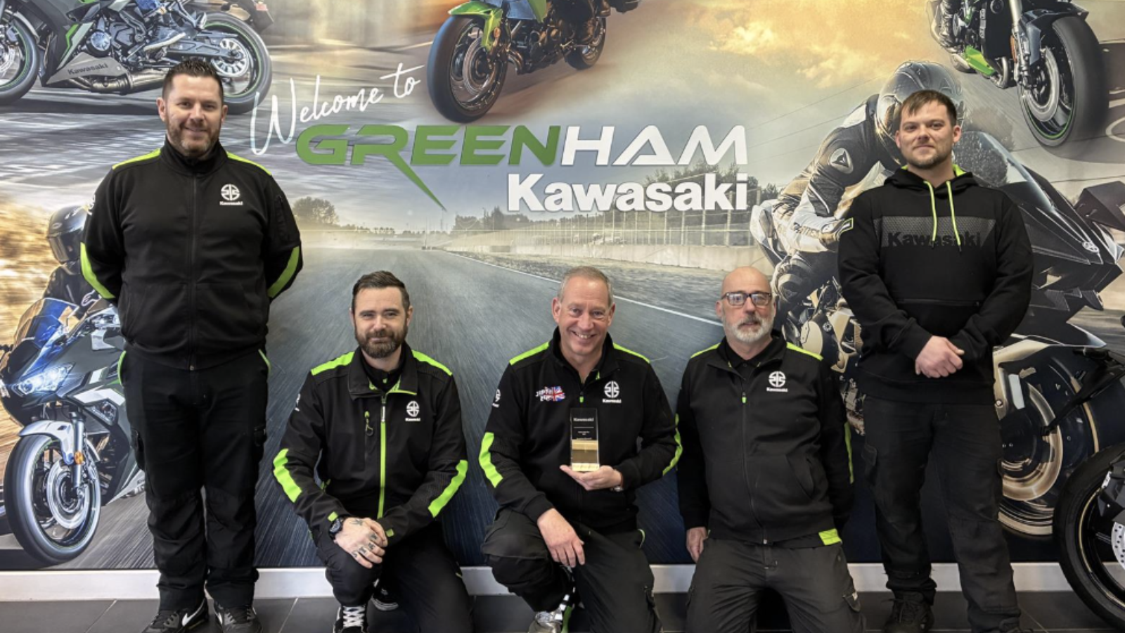 Greenham Kawasaki celebrating its dealer of the year award