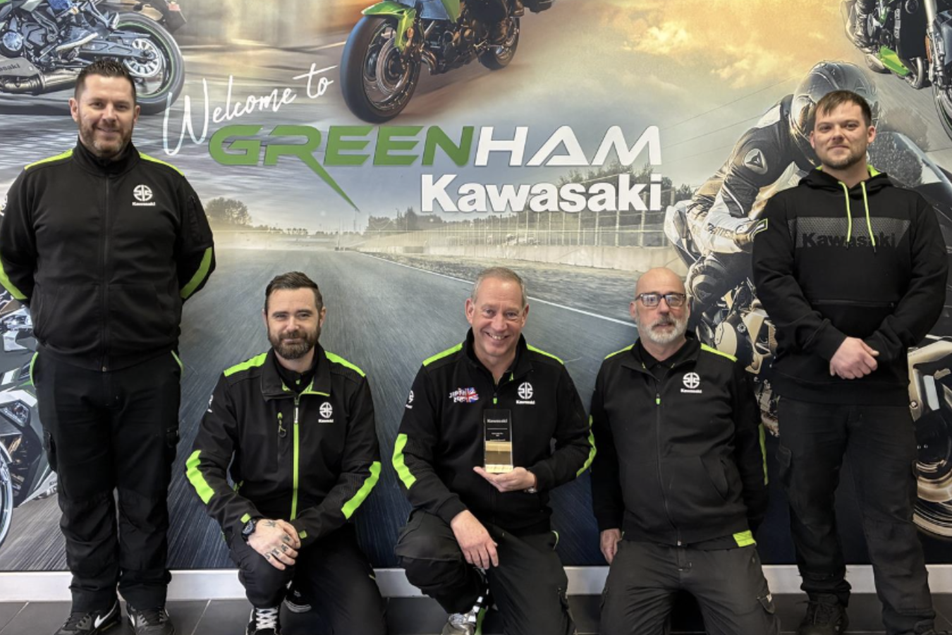 Greenham Kawasaki celebrating its dealer of the year award