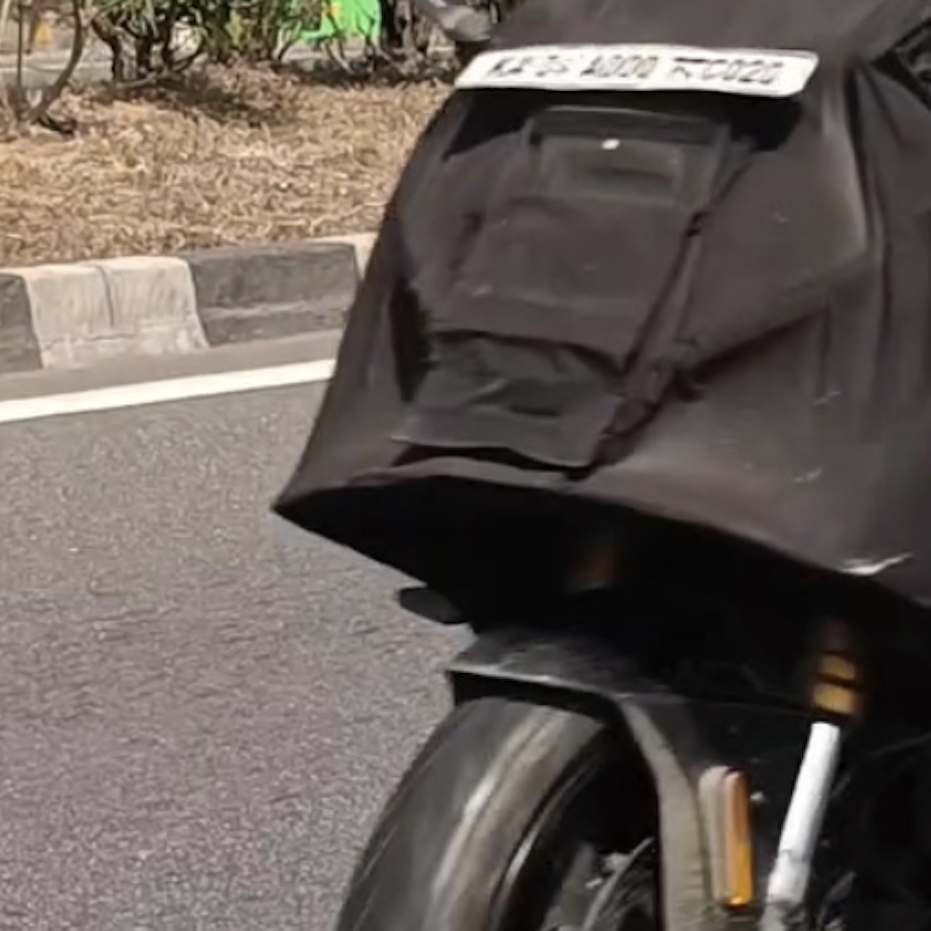 TVS Apache RR 450 under black cover. Credit: Facebook/Bikewale.