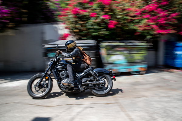 Honda CMX Rebel 1100 riding in an urban environment 