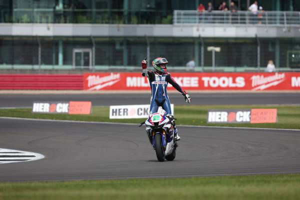 Glenn Irwin celebrates after BSB race win, Silverstone 2022. - Honda Racing Corporation.