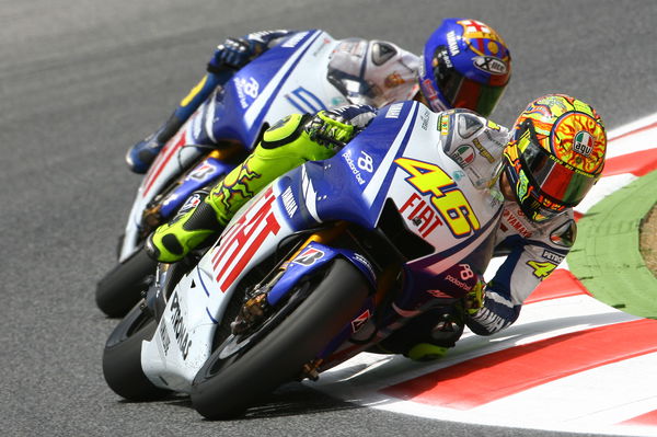 Valentino Rossi leads Jorge Lorenzo, 2009 MotoGP Catalan Grand Prix. - Gold and Goose