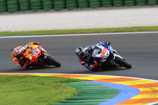 Jorge Lorenzo leads Marc Marc Marquez, 2013 Valencian Grand Prix. - Gold and Goose