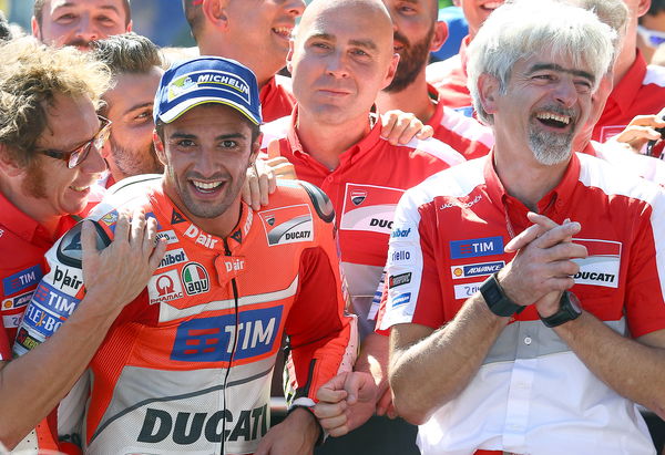 Andrea Iannone celebrates 2016 Austrian Grand Prix victory with Gigi Dall'Igna. - Gold and Goose