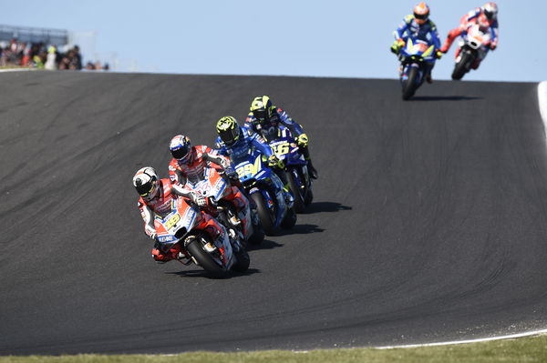 Alvaro Bautista leads Andrea Dovizioso, Andrea Iannone, Valentino Rossi, 2018 MotoGP Australian Grand Prix. - Gold and Goose