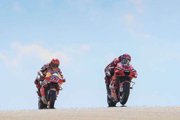 Francesco Bagnaia leads Marc Marquez, 2021 MotoGP Aragon Grand Prix. - Gold and Goose