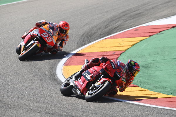 Francesco Bagnaia leads Marc Marquez, 2021 MotoGP Aragon Grand Prix. - Gold and Goose