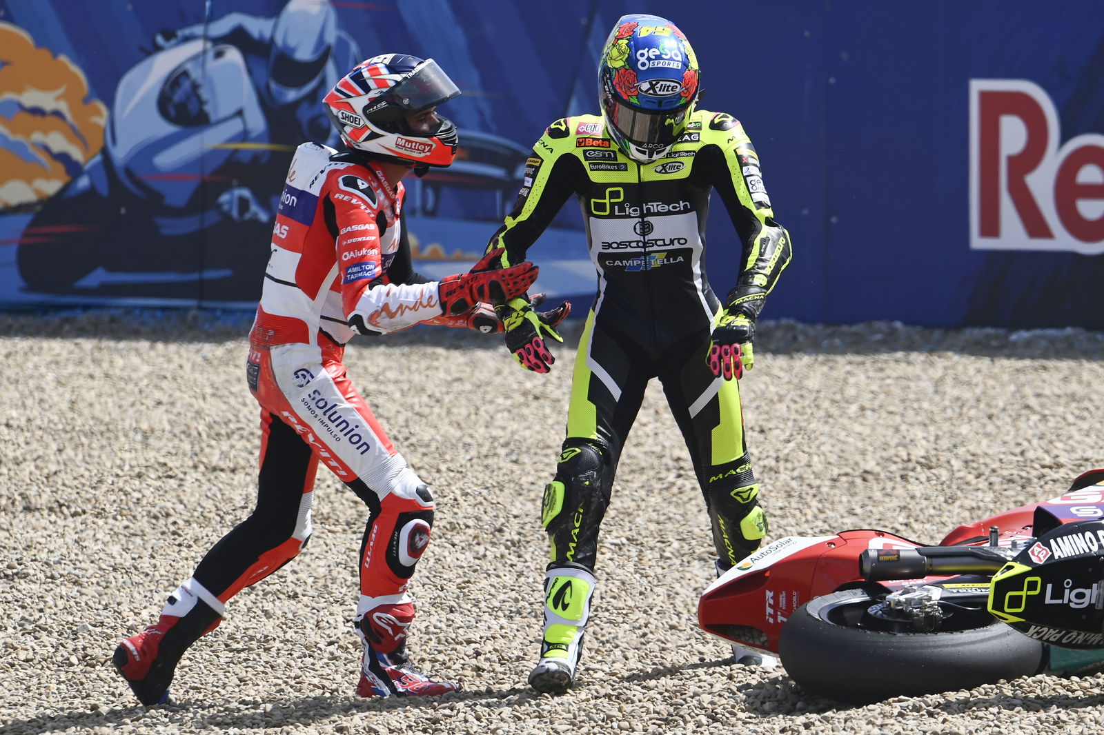 Jake Dixon and Fermin Aldeguer in Jerez T13 gravel trap, 2022 Spanish Moto2 Grand Prix. - Gold and Goose.