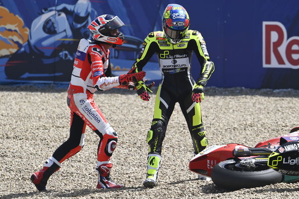 Jake Dixon and Fermin Aldeguer in Jerez T13 gravel trap, 2022 Spanish Moto2 Grand Prix. - Gold and Goose.