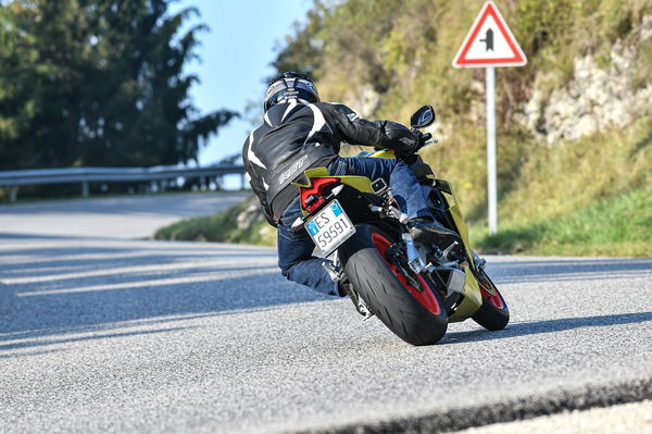 Aprilia RS660 riding up Alpine mountain road