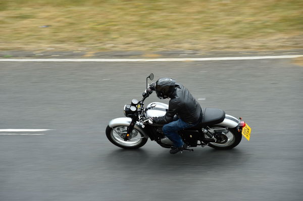 The BSA Gold Star Motorcycle riding on the road