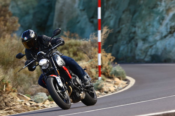 Triumph Trident cornering on a mountain road