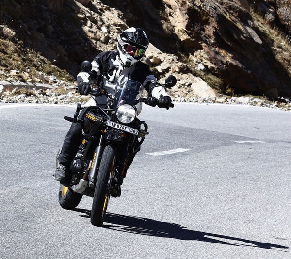 A Royal Enfield motorcycle heading into a hairpin bend