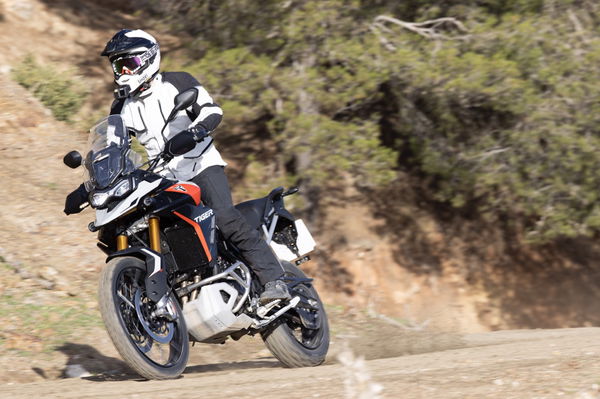 Power sliding a motorcycle on a dirt track