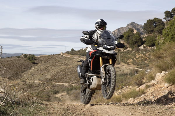 Power sliding a motorcycle on a dirt track