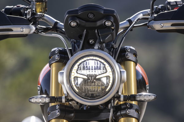 The front headlight of a motorbike