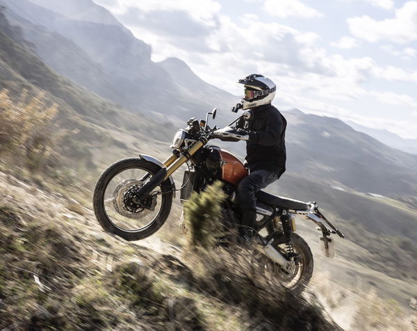 A motorcycle being ridden off-road