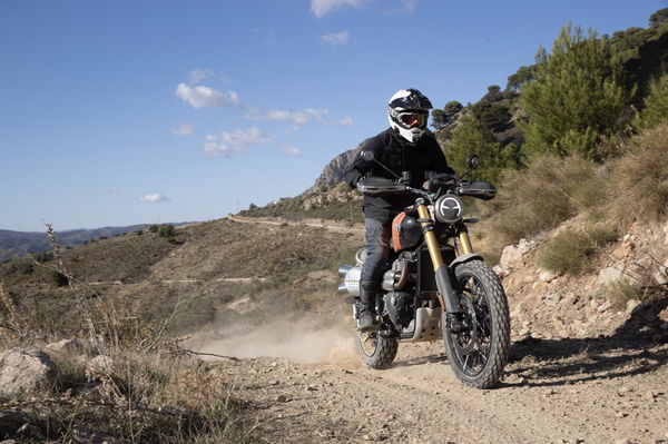 A motorbike being ridden off-road