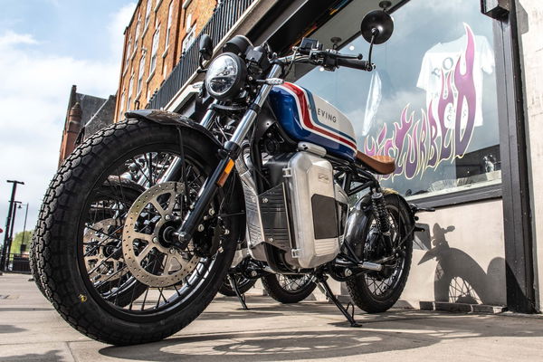 A motorcycle parked outside a shop in London