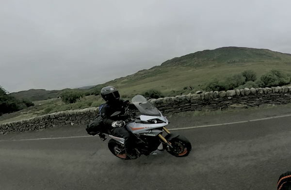 An electric motorcycle near the coast of Wales