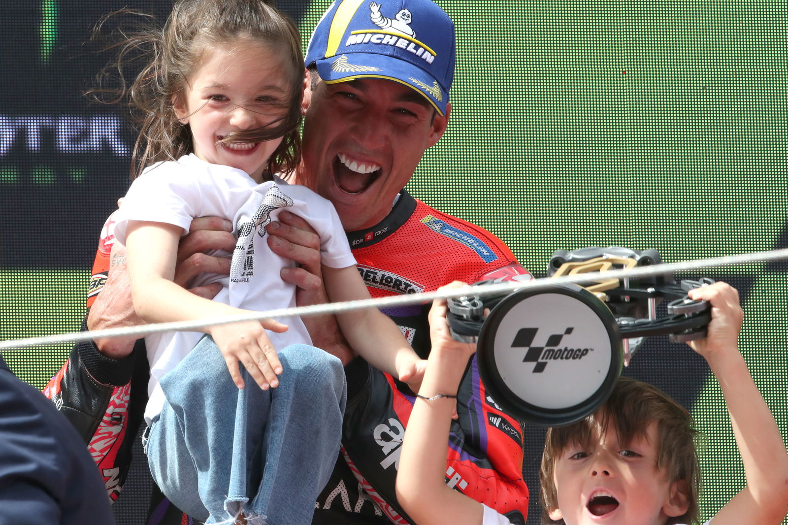 Aleix Espargaro, 2023 MotoGP Catalan Grand Prix podium. - Gold and Goose