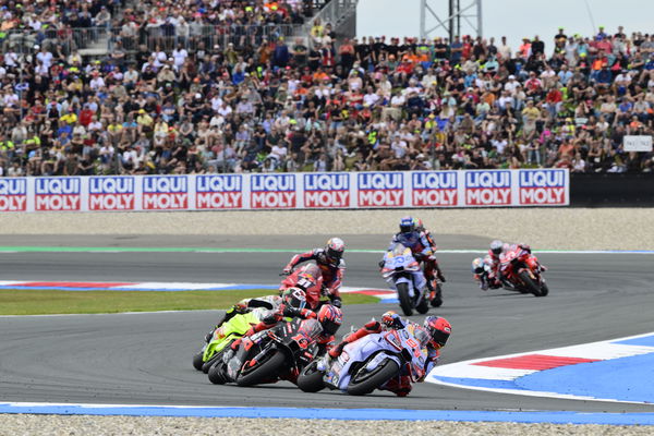 Marc Marquez leads Maverick Vinales, Fabio Di Giannantonio, 2024 MotoGP Dutch TT. - Gold and Goose