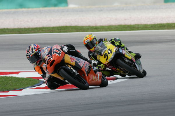 Casey Stoner, Andrea Dovizioso, 2004 125cc Malaysian Grand Prix. - Gold and Goose.