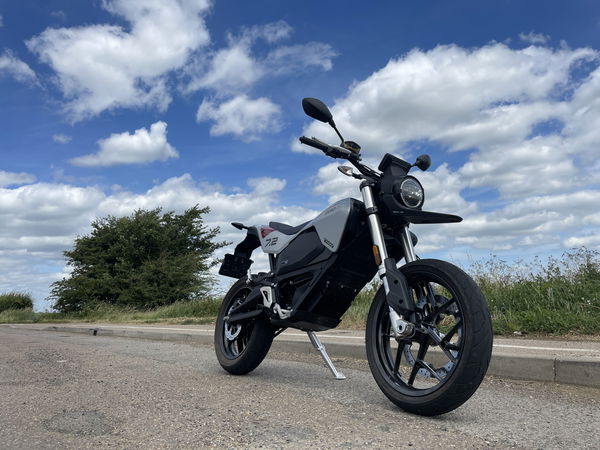 Zero Motorcycles FXE 7.2 11KW and blue sky with clouds.