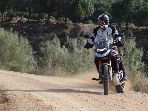 Power sliding a motorcycle on a dirt track