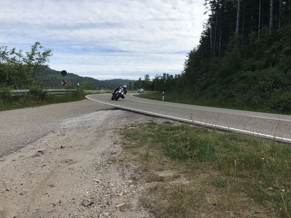 A BMW Riding along a German Road