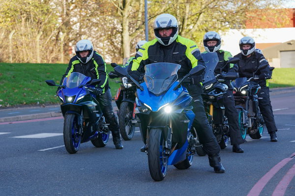 A group of motorcycle riders about to head out for a ride