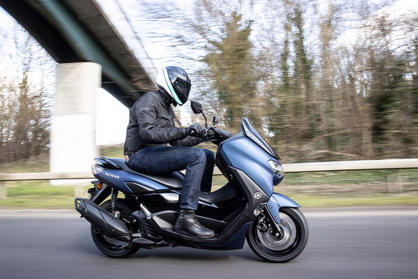 Yamaha NMAX side view on road