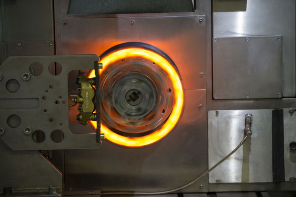 glowing brake discs being tested in the factory