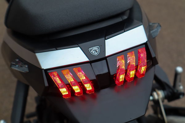 The taillights of the PM-01