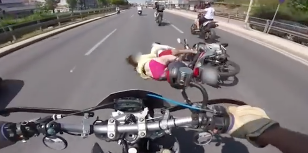 WATCH: Women wearing bikini slides down the road in Greece